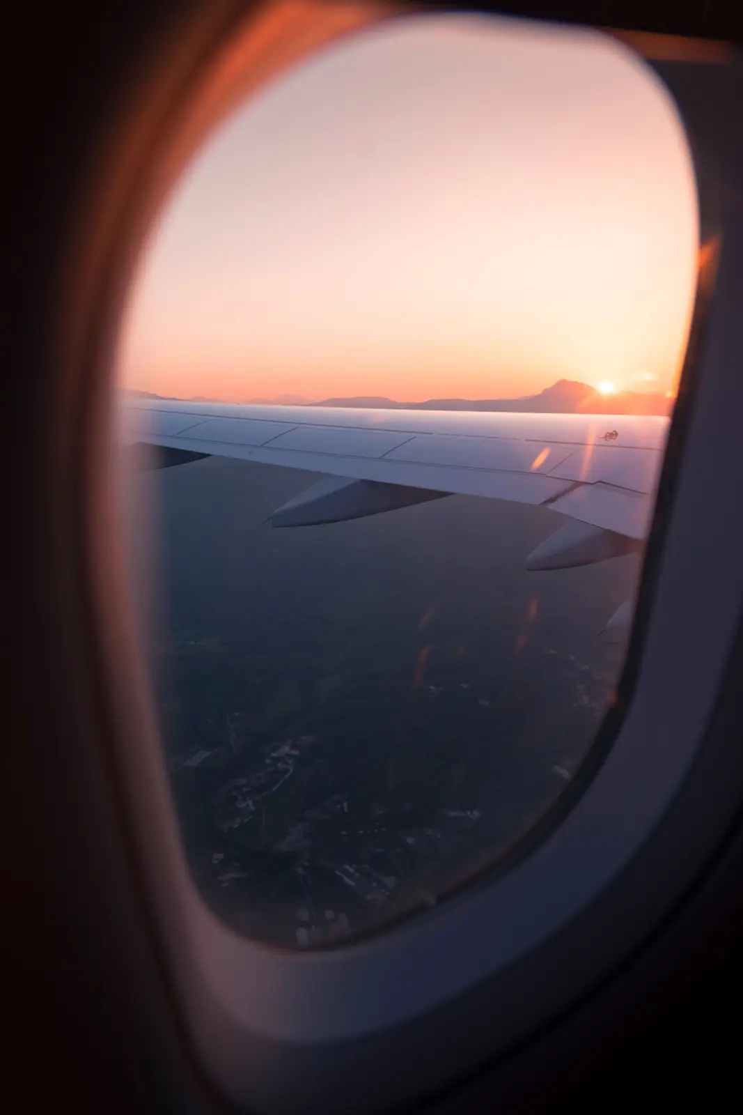 Sunset seen through an aircraft window